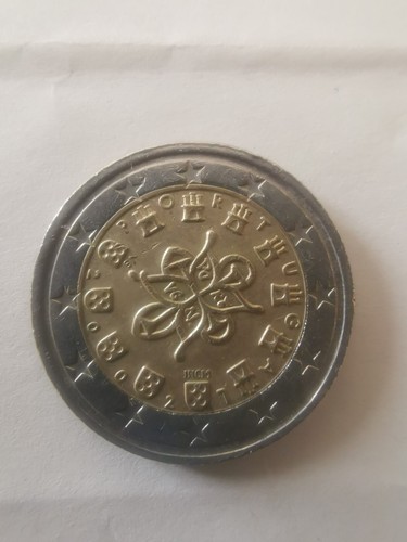 Una moneta euro circolata - moneta,